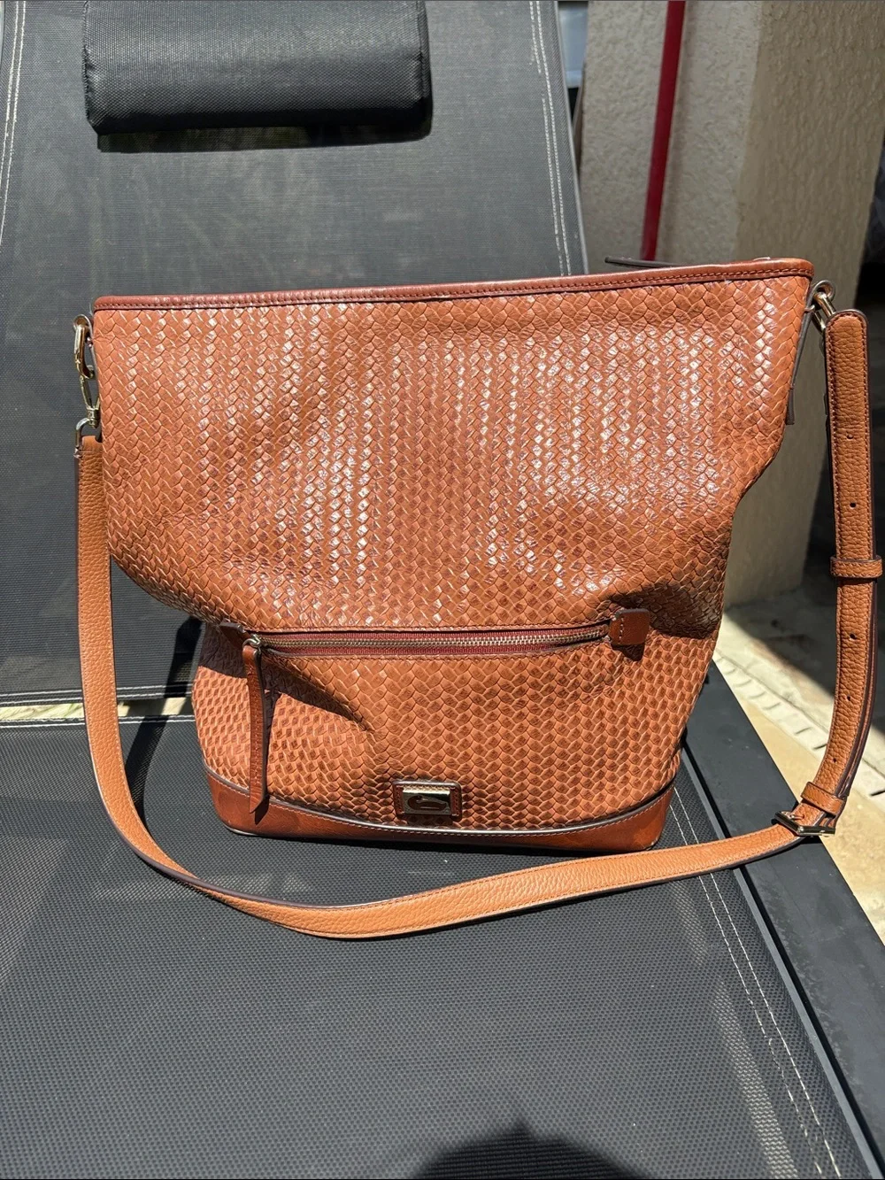 Dooney and Bourke woven leather crossbody